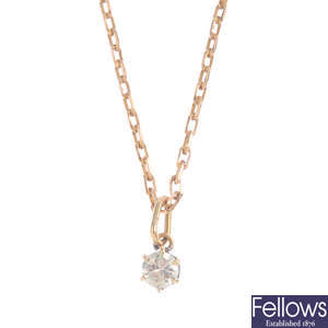 A diamond single-stone pendant with 9ct gold chain.