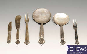 A selection of Georg Jensen silver flatware.