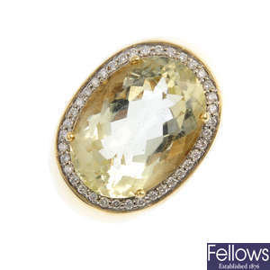 An 18ct gold diamond and citrine dress ring.