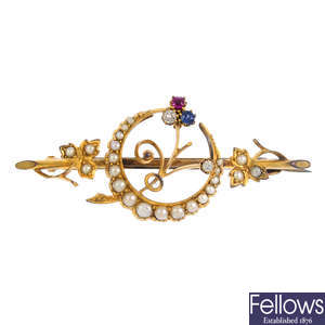 A late 19th century sapphire, ruby, pearl and diamond crescent brooch.