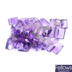 A selection of oval and rectangular-shape amethysts.
