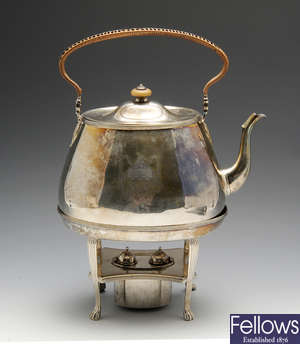 A George III silver tea kettle on stand.