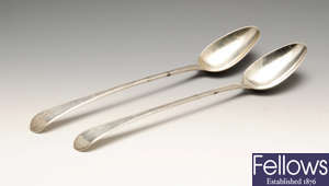 A pair of early George III silver basting spoons.