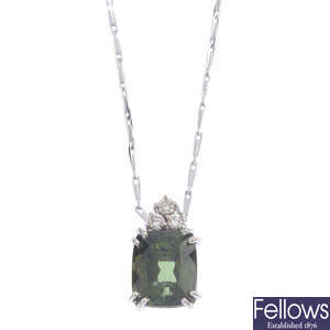 An 18ct gold tourmaline and diamond pendant, with chain.