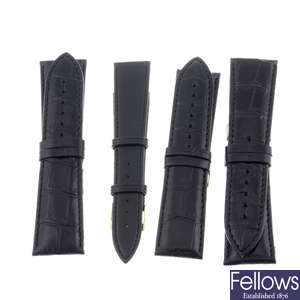 A selection of various black watch straps. Approximately 80.