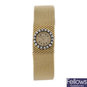 JAEGER-LECOULTRE - a lady's yellow metal bracelet watch.