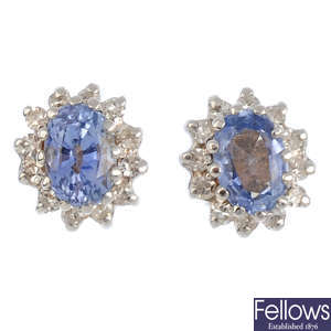 A pair of 9ct gold sapphire and diamond cluster stud earrings.