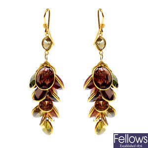 A pair of multi-gemstone earrings.