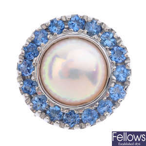 A platinum mabe pearl and aquamarine cluster ring.  