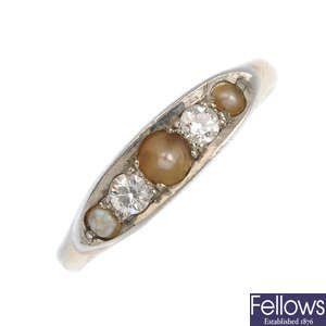 An early 20th century platinum and 18ct gold diamond and split pearl ring.