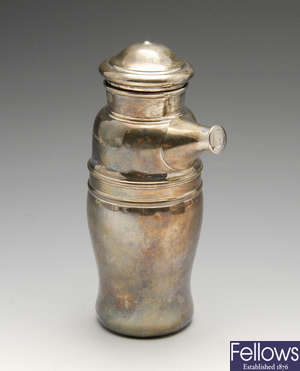 A 1920's silver cocktail shaker. 