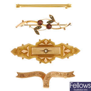Four late 19th to early 20th century century gold brooches.