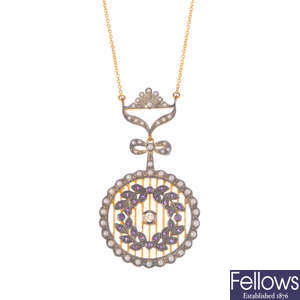 A diamond and gem-set pendant.