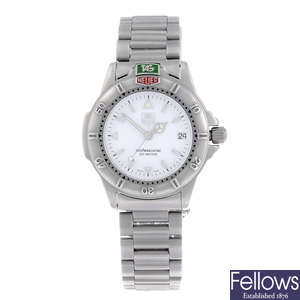 TAG HEUER - a mid-size 4000 Series stainless steel bracelet watch.
