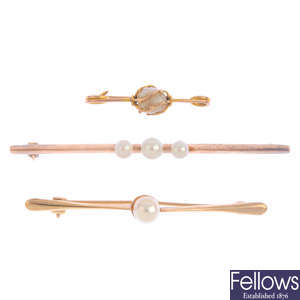 Three gold cultured pearl brooches.
