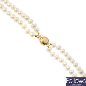 Four cultured pearl necklaces.