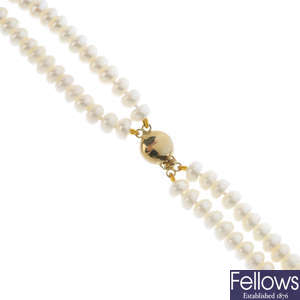 Four cultured pearl two-row necklaces.