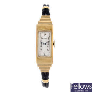 ROLEX - a lady's yellow metal wrist watch.