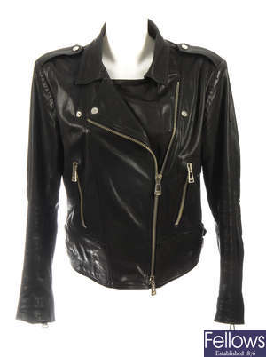 BELSTAFF - a black leather biker jacket.