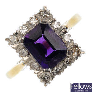 (550243-2-A) An 18ct gold amethyst and diamond cluster ring.