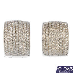 (549759-2-A) A pair of diamond earrings.