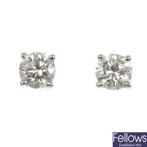(550716-4-A) A pair of 18ct gold brilliant-cut diamond stud earrings.