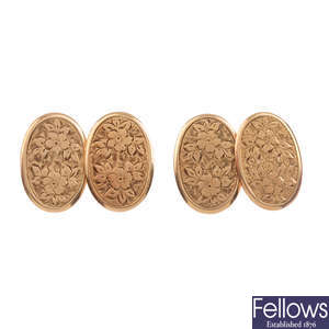 A pair of near matched 9ct gold cufflinks.