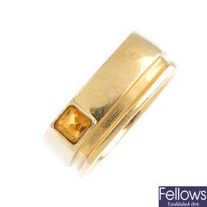 A citrine band ring.