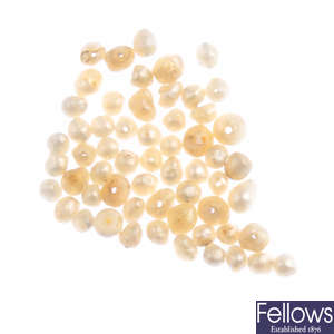Two seed pearl strands and loose seed pearls.