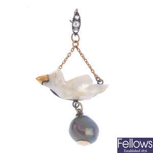 A pearl and diamond novelty pendant.