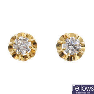A pair of 18ct gold diamond ear studs.