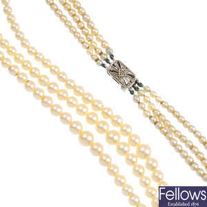 A cultured pearl three-row necklace, with 9ct gold clasp.