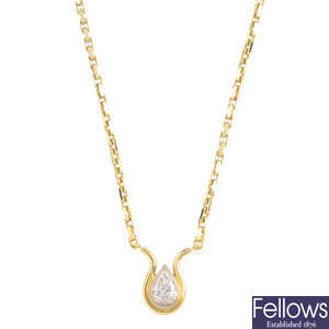 An 18ct gold diamond single-stone pendant.