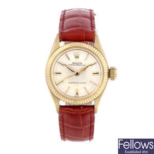 ROLEX - a lady's yellow metal Oyster Perpetual wrist watch.