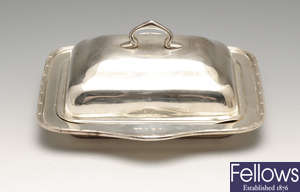 A 1920' s silver butter dish with glass liner.