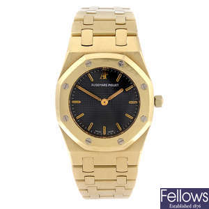 AUDEMARS PIGUET - a lady's 18ct yellow gold Royal Oak bracelet watch.