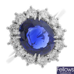 An 18ct gold Madagascan sapphire and diamond cluster ring.