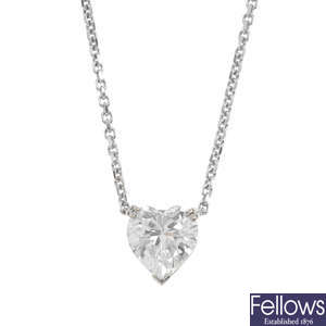 A diamond heart pendant, on chain.