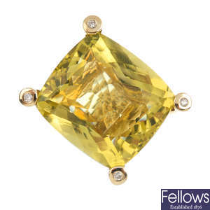 A 9ct gold yellow quartz and diamond dress ring.