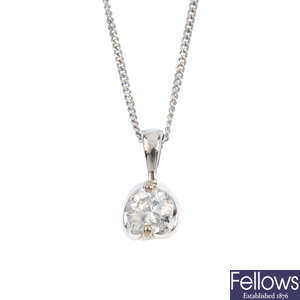 A diamond pendant, with an 18ct gold chain.