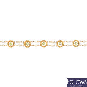 An early 20th century 15ct gold peridot and seed pearl bracelet.