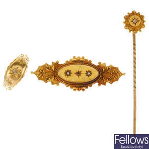 Three early 20th century items of gold and diamond jewellery.