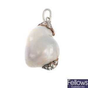 A baroque natural pearl and diamond pendant.