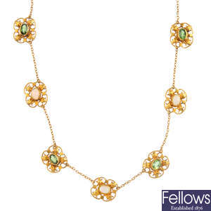 An Arts and Crafts gold gem-set necklace. 
