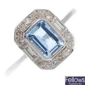 An 18ct white gold aquamarine and diamond ring.