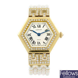 CARTIER - an 18ct yellow gold factory diamond set and cultured pearl bracelet watch.