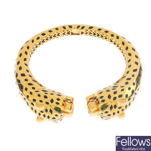 An enamel leopard hinged bangle.
