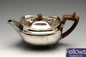 A George III silver bachelor teapot.