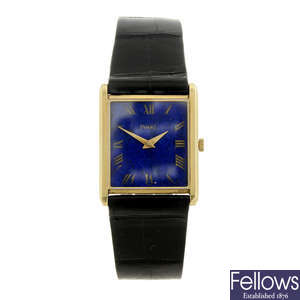 PIAGET - a lady's yellow metal wrist watch.