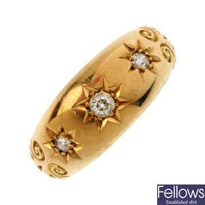 An early 20th century 18ct gold diamond three-stone ring.